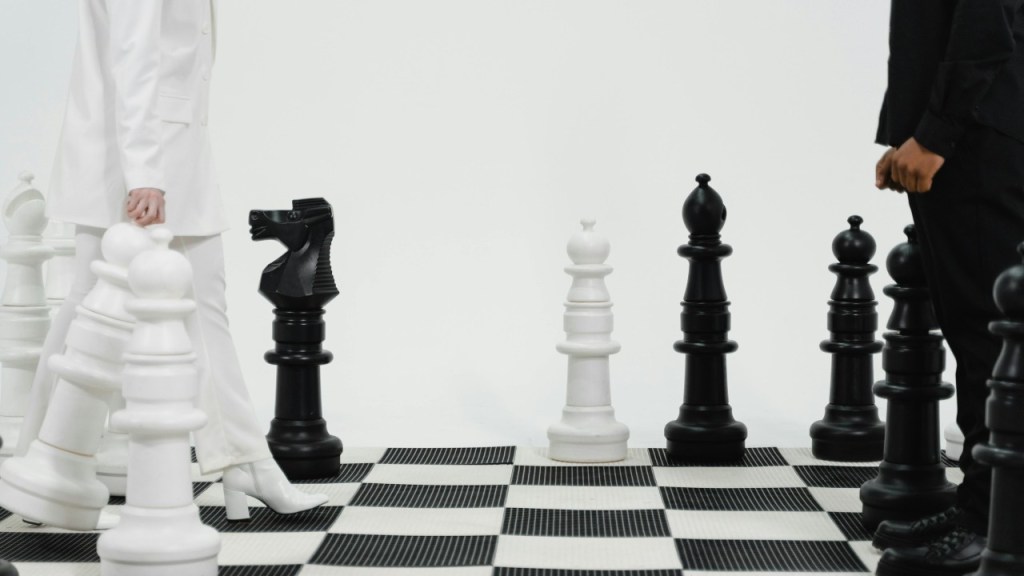 Us vs Them at Work: Understanding and Reducing Resistance to&nbsp;Collaboration